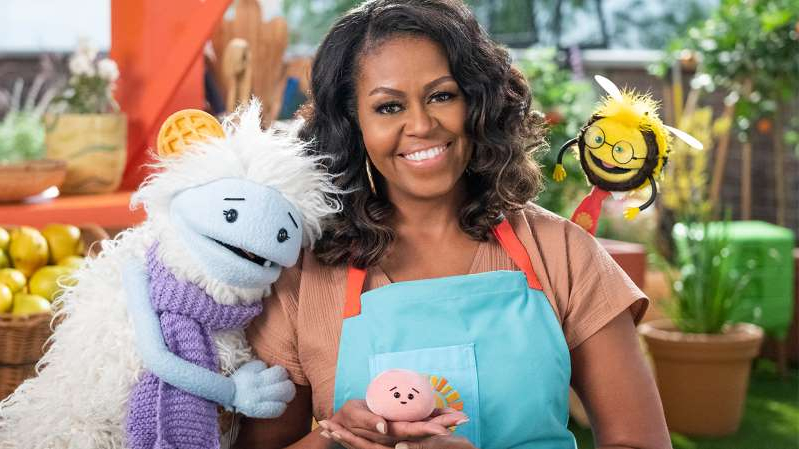 michelle obama holding a stuffed animal photo