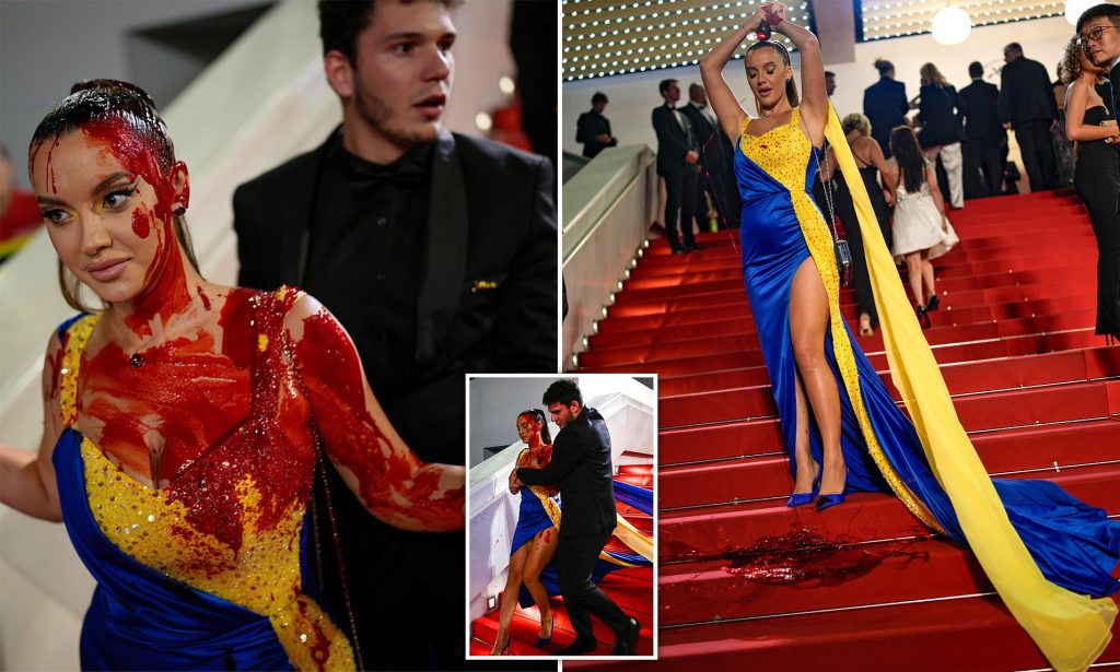 Festival de Cannes : Vêtue aux couleurs de l’Ukraine, une femme se verse du faux sang dessus