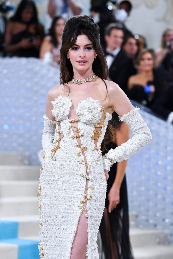 Anne Hathaway Makes a Splash In All White at 2023 Met Gala Following a 5 Year Absence 592